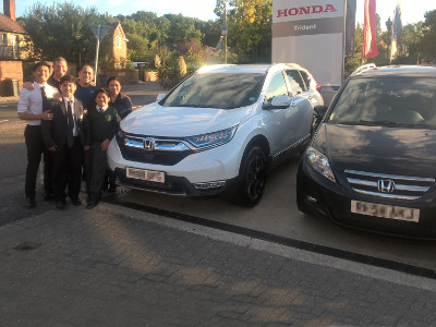 The Aure family collect their new 7-seater Honda CR-V