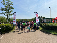Trident Honda 60th Anniversary banners at the entrance to Goldsworth Park lake