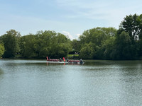 Two dragon boats race across Goldsworth Park lake