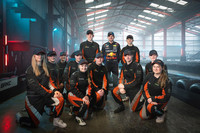 Budding racers pose for photograph with Max Verstappen