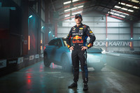 Max Verstappen stands in front of the all-new, all-electric, Honda e-Ny1
