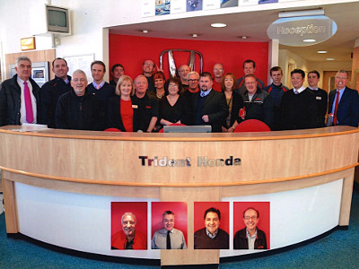 Paul Barnett with his colleagues from Trident Honda Weybridge